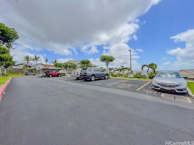 92-1226 Palahia St Unit Cc105, Kapolei, HI 96707 - view of asphalt street featuring street lighting, curbs, and a residential view