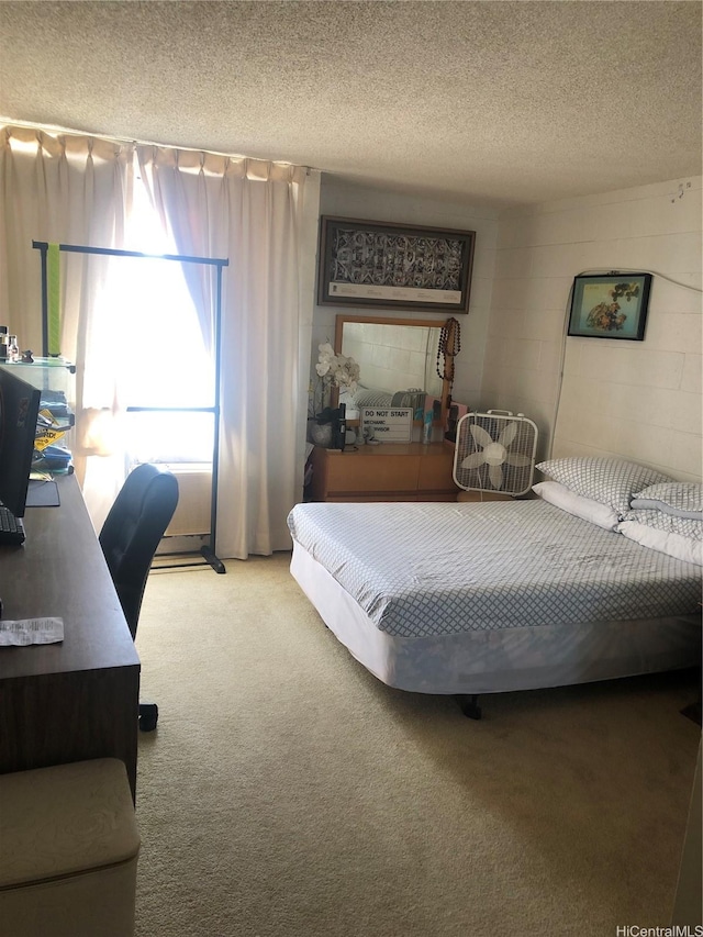 647 Kunawai Ln Unit A507, Honolulu, HI 96817 - carpeted bedroom with concrete block wall and a textured ceiling