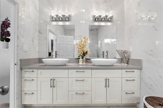 45-333 Mahalani St, Kaneohe, HI 96744 - full bathroom with tile walls, a marble finish shower, and double vanity