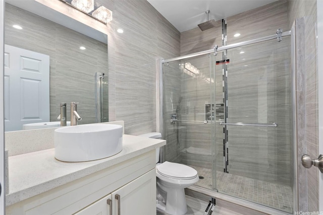 45-333 Mahalani St, Kaneohe, HI 96744 - bathroom with a stall shower, vanity, and toilet