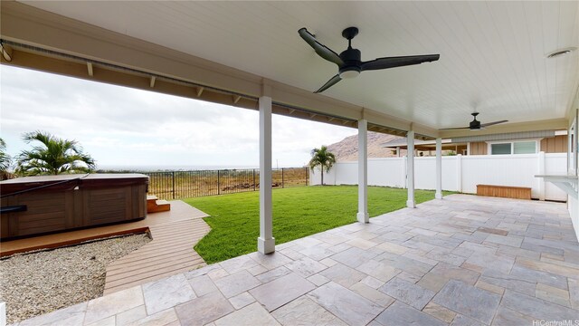 84-575 Kili Dr Unit 8, Waianae, HI 96792 - view of patio / terrace featuring a hot tub and a ceiling fan