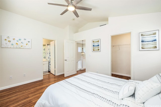 91-6414 Kapolei Pkwy, Ewa Beach, HI 96706 - bedroom with vaulted ceiling, dark wood-style flooring, a spacious closet, baseboards, and a closet