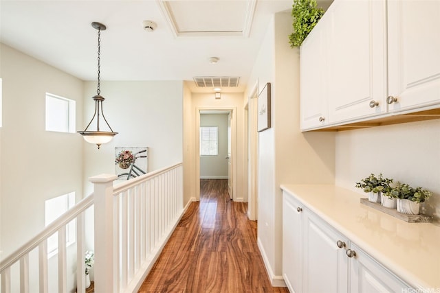 91-6414 Kapolei Pkwy, Ewa Beach, HI 96706 - hallway featuring light wood-type flooring, an upstairs landing, and baseboards