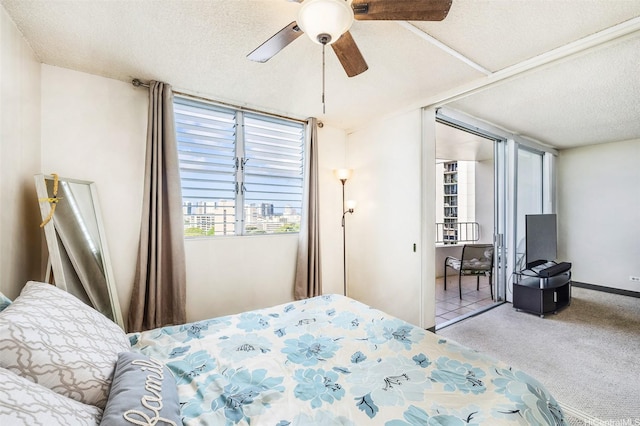 1805 Poki St Unit 1101, Honolulu, HI 96822 - carpeted bedroom featuring a textured ceiling, ceiling fan, and access to outside