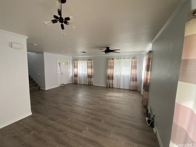 92-7049 Elele St Unit 71, Kapolei, HI 96707 - unfurnished living room featuring stairs, dark wood-style floors, baseboards, a ceiling fan, and ornamental molding