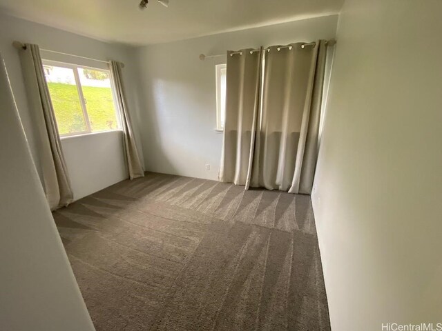 92-7049 Elele St Unit 71, Kapolei, HI 96707 - empty room featuring carpet flooring