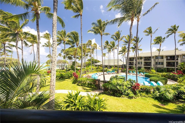 view of property's community featuring a swimming pool