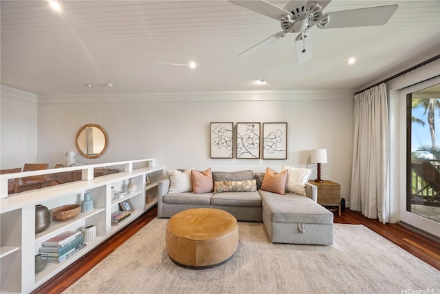 living room with recessed lighting, ornamental molding, ceiling fan, and wood finished floors