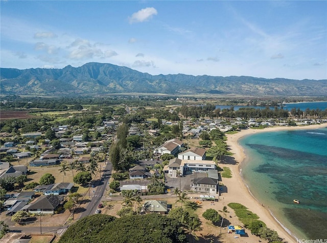 aerial view featuring a water and mountain view and a residential view