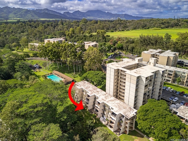 95-2027 Waikalani Pl Unit A102, Mililani, HI 96789 - drone / aerial view of a mountain backdrop and a forest