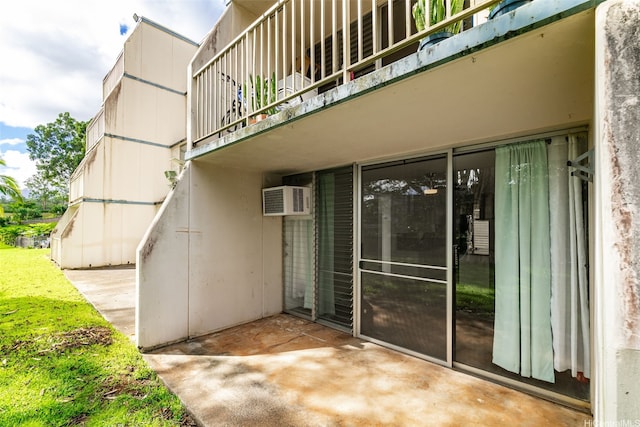 95-2027 Waikalani Pl Unit A102, Mililani, HI 96789 - property entrance with a patio, a balcony, and a wall unit AC