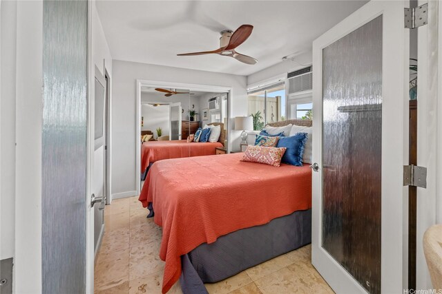 75 Kihapai St Unit 11, Kailua, HI 96734 - bedroom featuring ceiling fan and an AC wall unit