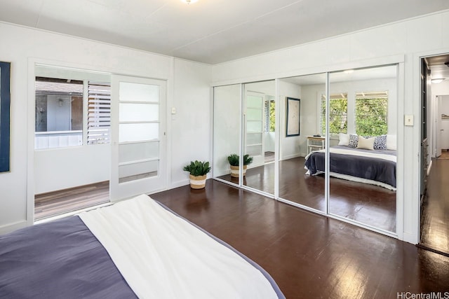 2023 Round Top Dr, Honolulu, HI 96822 - bedroom with wood finished floors, a closet, and baseboards