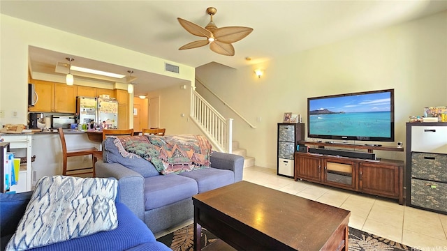 92-1490 Aliinui Dr Unit 803, Kapolei, HI 96707 - living area featuring stairway, light tile patterned floors, and a ceiling fan