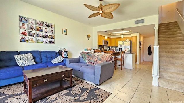 92-1490 Aliinui Dr Unit 803, Kapolei, HI 96707 - living area featuring light tile patterned floors, stairs, ceiling fan, and a tray ceiling