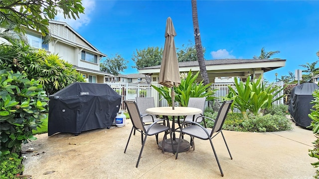 92-1490 Aliinui Dr Unit 803, Kapolei, HI 96707 - view of patio featuring fence, grilling area, and outdoor dining area