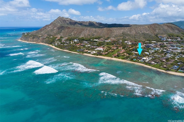 bird's eye view featuring a residential view, a beach view, and a water and mountain view