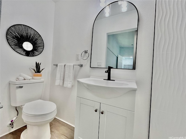 87-224 Laulele St, Waianae, HI 96792 - bathroom with toilet, vanity, and baseboards