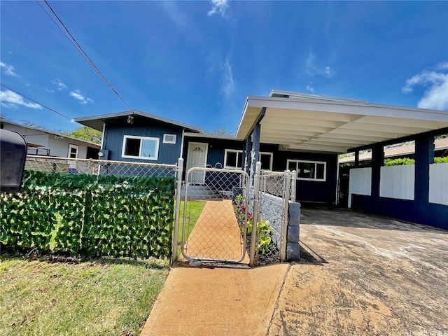 87-224 Laulele St, Waianae, HI 96792 - view of front of house with driveway, fence, a gate, and a carport
