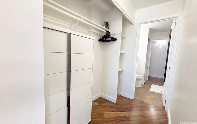 spacious closet featuring wood finished floors