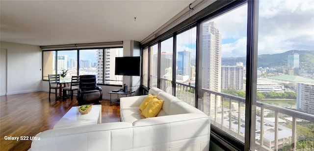 1778 Ala Moana Blvd Unit 2506, Honolulu, HI 96815 - living room with wood finished floors and baseboards