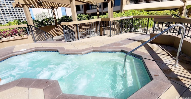 view of pool featuring a patio