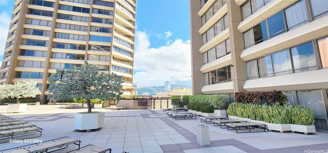 1778 Ala Moana Blvd Unit 2506, Honolulu, HI 96815 - view of home's community with a patio and a mountain view