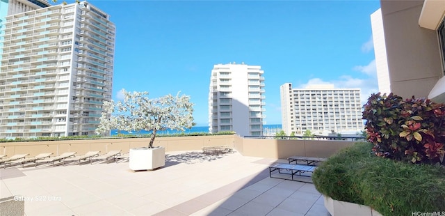 view of patio / terrace with a water view