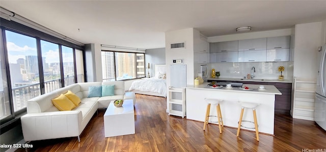 living area with dark wood-style floors