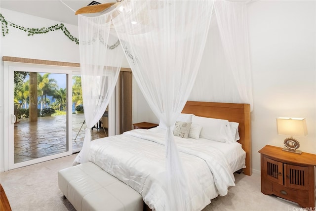 31-212 Hawaii Belt Rd, Hakalau, HI 96710 - carpeted bedroom featuring access to exterior