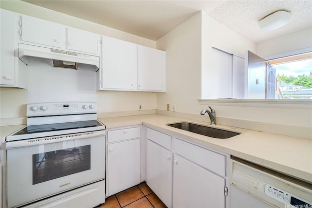 95-1059 Koolani Dr Unit 2, Mililani, HI 96789 - kitchen featuring a sink, white appliances, under cabinet range hood, light countertops, and white cabinets