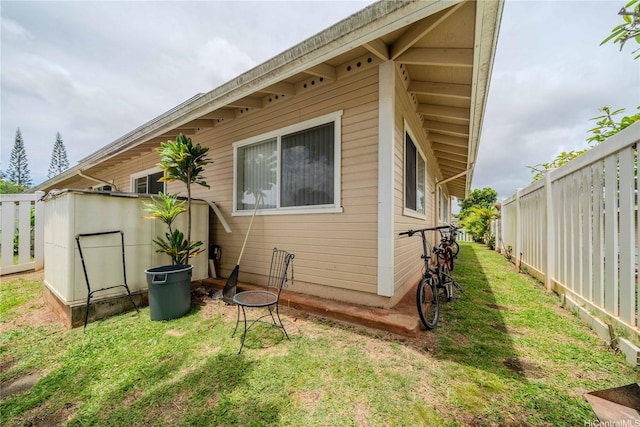 95-1059 Koolani Dr Unit 2, Mililani, HI 96789 - back of house featuring a fenced backyard and a yard