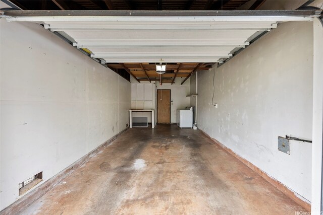 94-1061 Anania Cir Unit 33, Mililani, HI 96789 - garage featuring washer / clothes dryer and a garage door opener