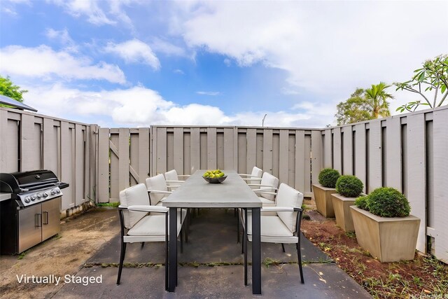 94-1061 Anania Cir Unit 33, Mililani, HI 96789 - view of patio with area for grilling, outdoor dining area, and a fenced backyard