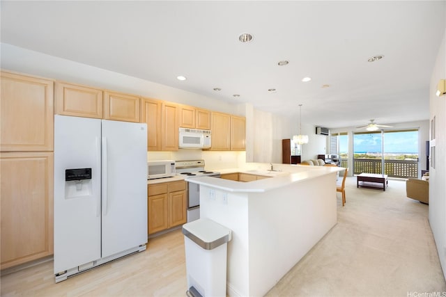 1305 Moanalualani Pl Unit 25C, Honolulu, HI 96819 - kitchen with white appliances, light brown cabinetry, open floor plan, recessed lighting, and a ceiling fan