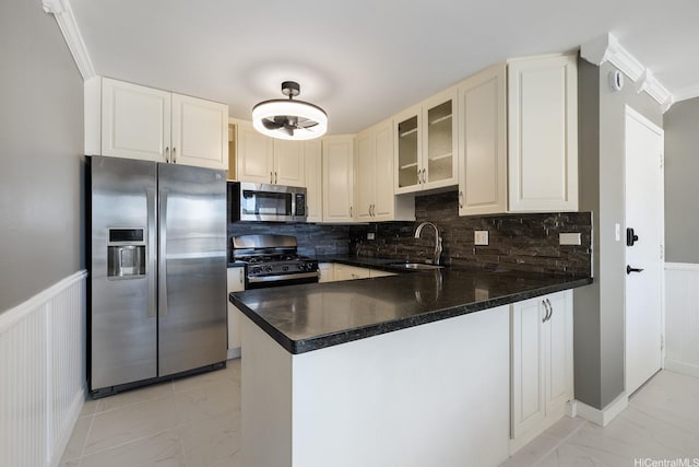 2452 Tusitala St Unit 1610, Honolulu, HI 96815 - kitchen with stainless steel appliances, light marble finish floors, a sink, a peninsula, and glass insert cabinets