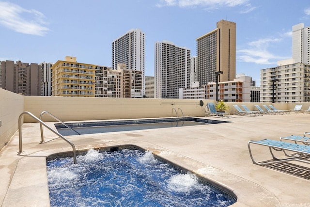 2452 Tusitala St Unit 1610, Honolulu, HI 96815 - view of pool with a hot tub and a view of skyline