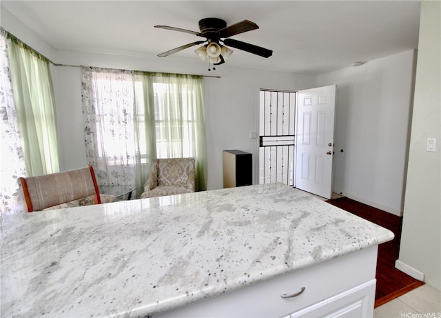 45-510 Pahia Rd, Kaneohe, HI 96744 - dining area featuring ceiling fan, wood finished floors, and baseboards