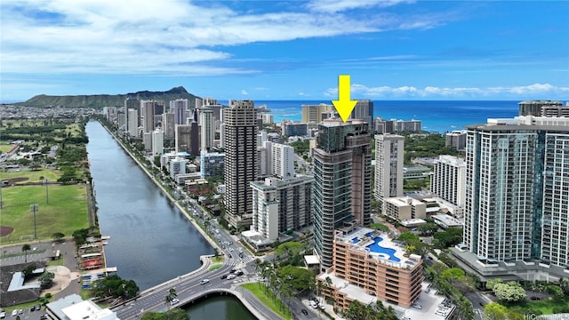 view of urban area with a large body of water