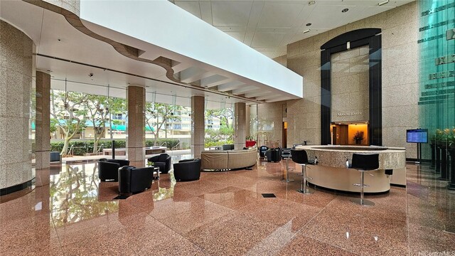 building lobby featuring a high ceiling