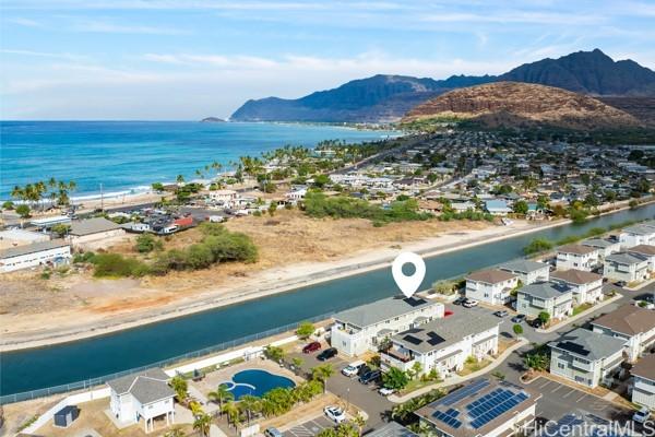 bird's eye view of a water and mountain view