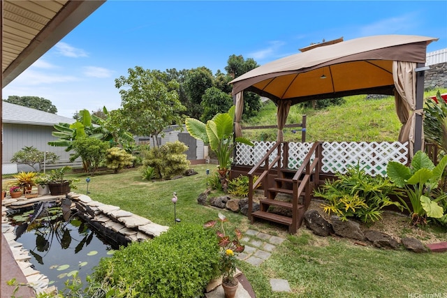 1328 Hele St, Kailua, HI 96734 - view of grassy yard featuring a gazebo and a garden pond