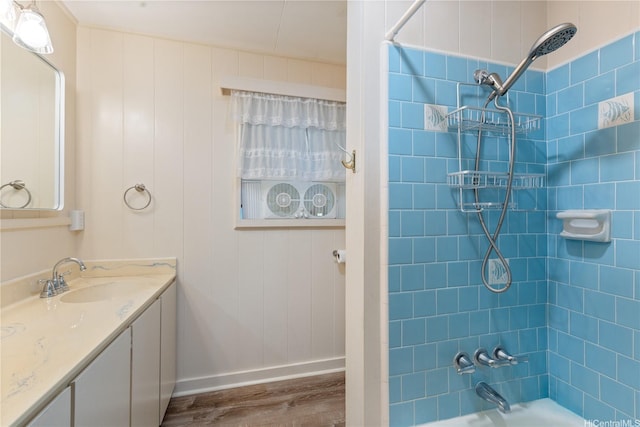 1328 Hele St, Kailua, HI 96734 - full bathroom with wood finished floors, baseboards, vanity, and shower / bath combination