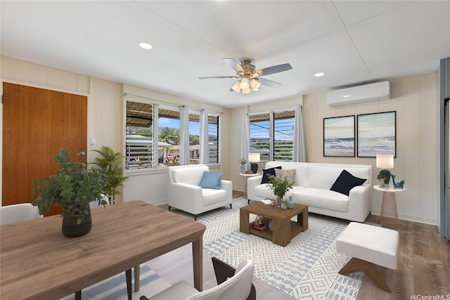 1328 Hele St, Kailua, HI 96734 - living area with an AC wall unit, wood finished floors, a decorative wall, ceiling fan, and recessed lighting