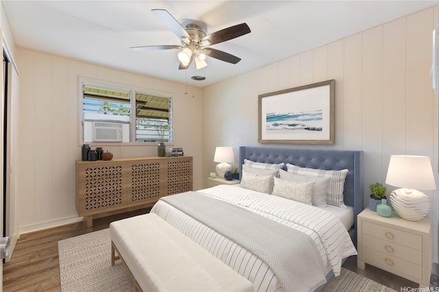 1328 Hele St, Kailua, HI 96734 - bedroom with wood finished floors, cooling unit, and a ceiling fan