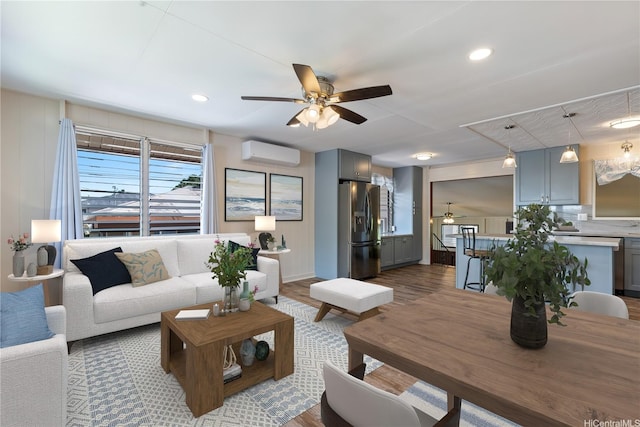 1328 Hele St, Kailua, HI 96734 - living area featuring a ceiling fan, a wall unit AC, wood finished floors, and recessed lighting