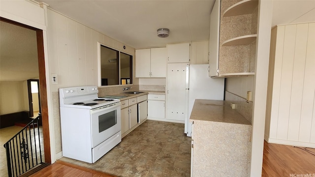 1328 Hele St, Kailua, HI 96734 - kitchen with white electric range, open shelves, light countertops, white cabinets, and a sink