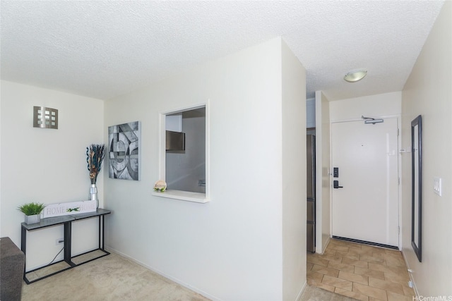 98-1038 Moanalua Rd Unit 1905, Aiea, HI 96701 - corridor featuring a textured ceiling and baseboards