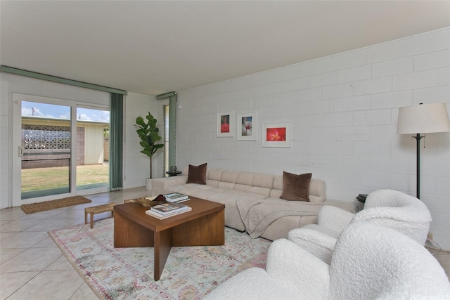 1548 Piikea St, Honolulu, HI 96818 - living room featuring concrete block wall and light tile patterned floors