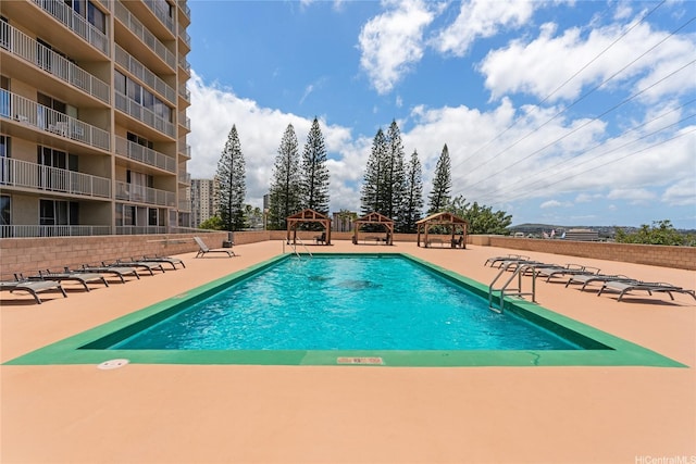 98-099 Uao Pl Unit 2408, Aiea, HI 96701 - view of pool featuring a gazebo and fence